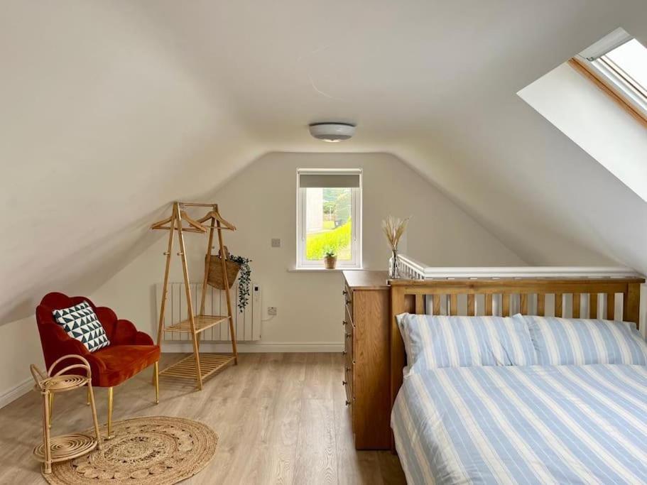Postel nebo postele na pokoji v ubytování Muckish Maison
