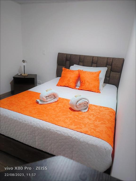 Postel nebo postele na pokoji v ubytování Hotel Kristal Ferial