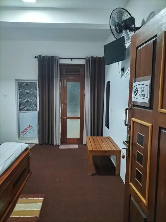 Postel nebo postele na pokoji v ubytování Kithaya Ella
