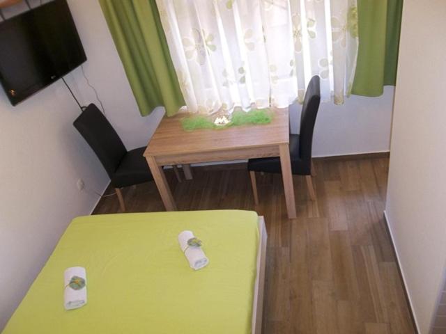 Кровать или кровати в номере Apartment Vrančić
