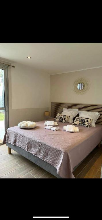 Postel nebo postele na pokoji v ubytování La Villa Manee
