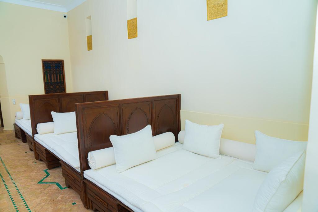 Postel nebo postele na pokoji v ubytování Riad Dar Zaouia