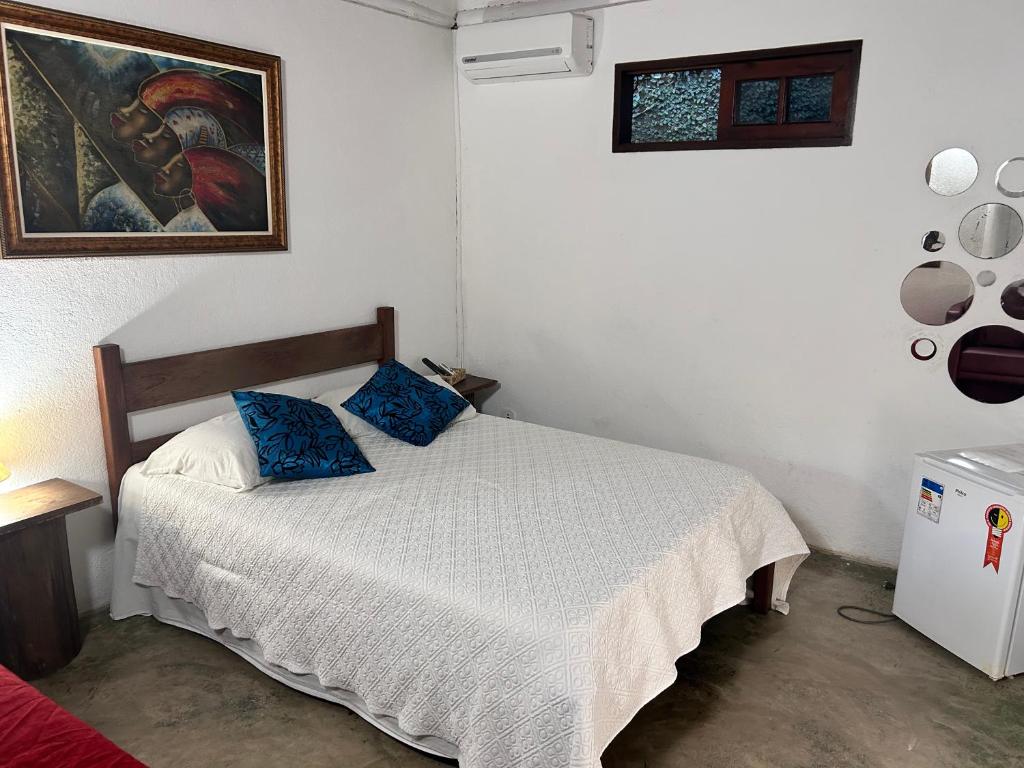 Postel nebo postele na pokoji v ubytování Pousada Estalagem Paraty