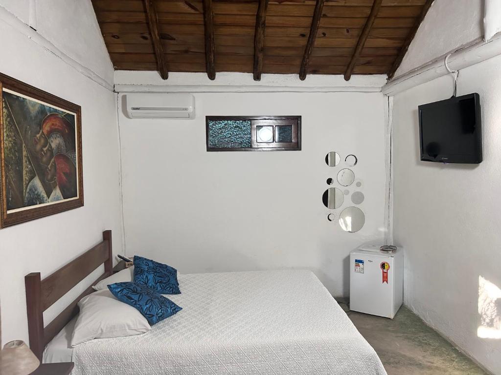 Postel nebo postele na pokoji v ubytování Pousada Estalagem Paraty