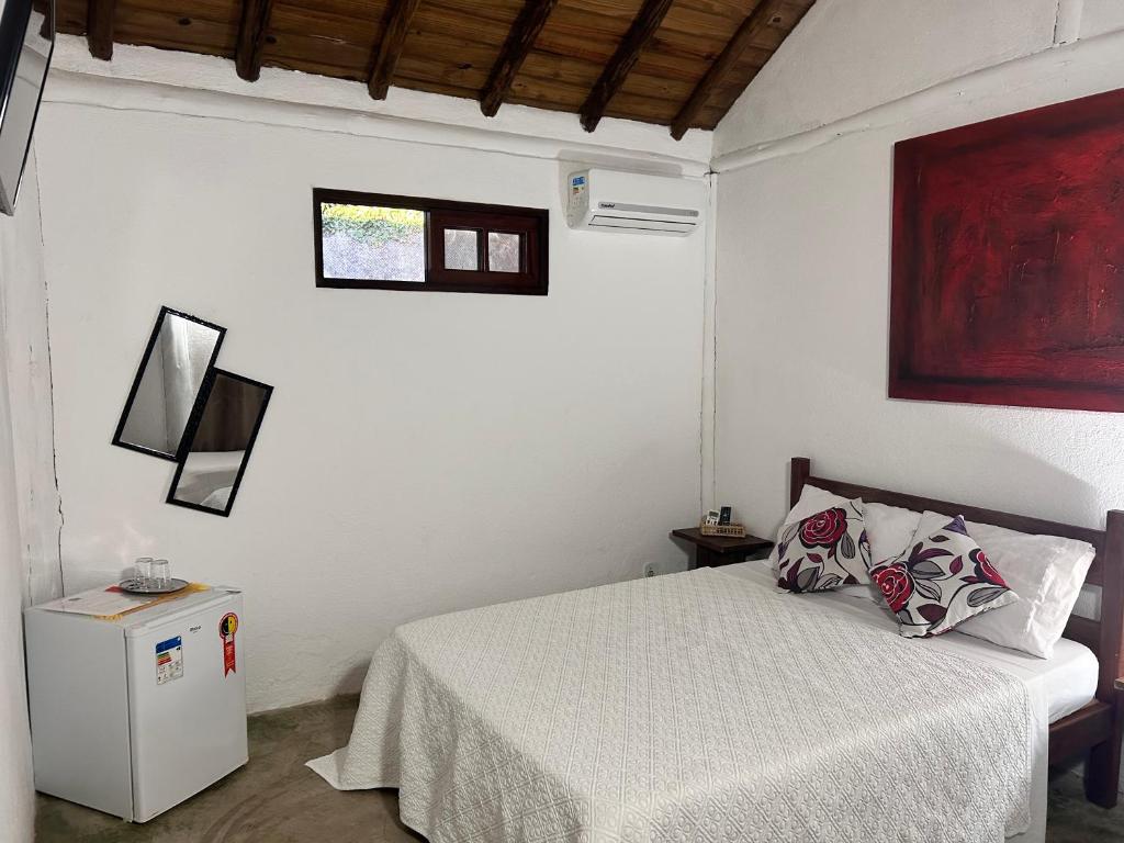 Postel nebo postele na pokoji v ubytování Pousada Estalagem Paraty