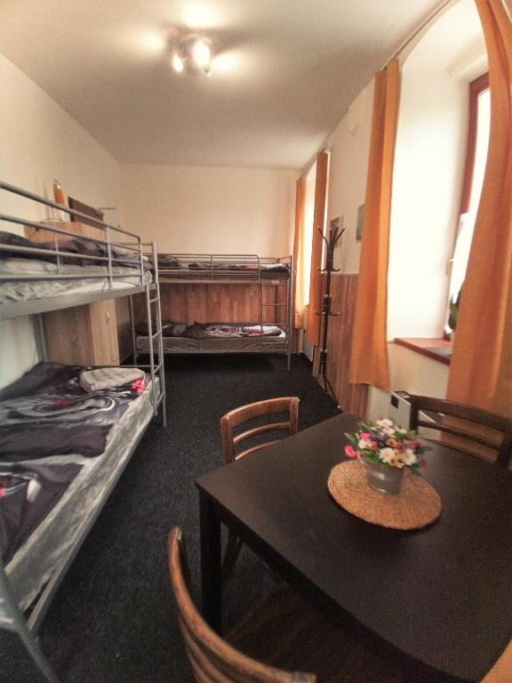 Postel nebo postele na pokoji v ubytování Nocleh U Kapličky