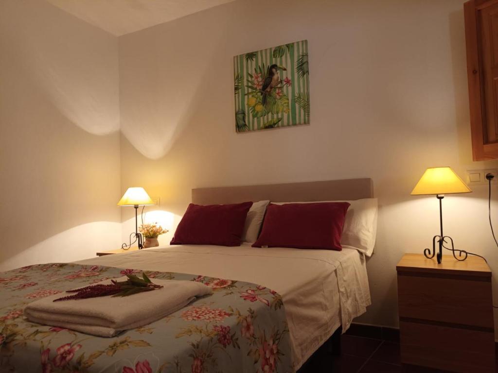 Postel nebo postele na pokoji v ubytování Casa Alameda