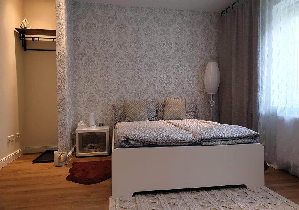 En eller flere senge i et værelse på Gemütliche Einzimmerwohnung