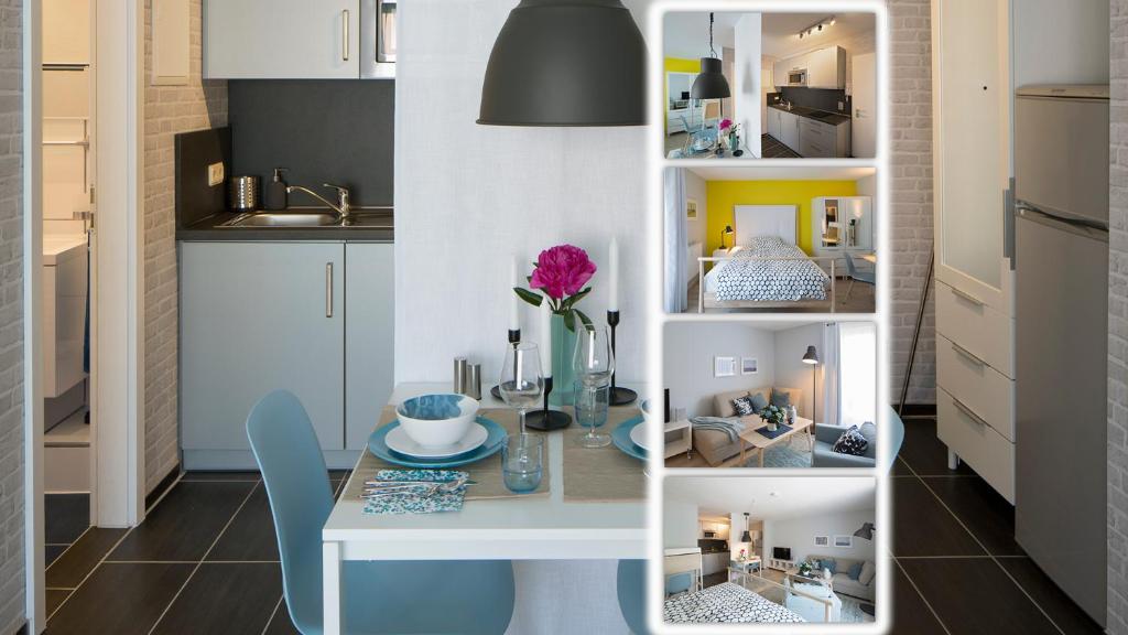 a kitchen with a table and a dining room at Exklusives Apartment inklusive Netflix und Parkplatz in Karlsruhe