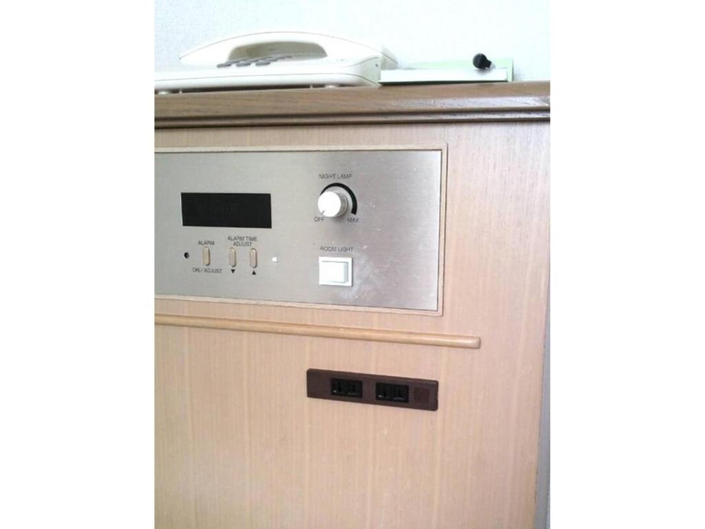 Sunwest Hotel Sasebo - Vacation STAY 22075vにあるキッチンまたは簡易キッチン