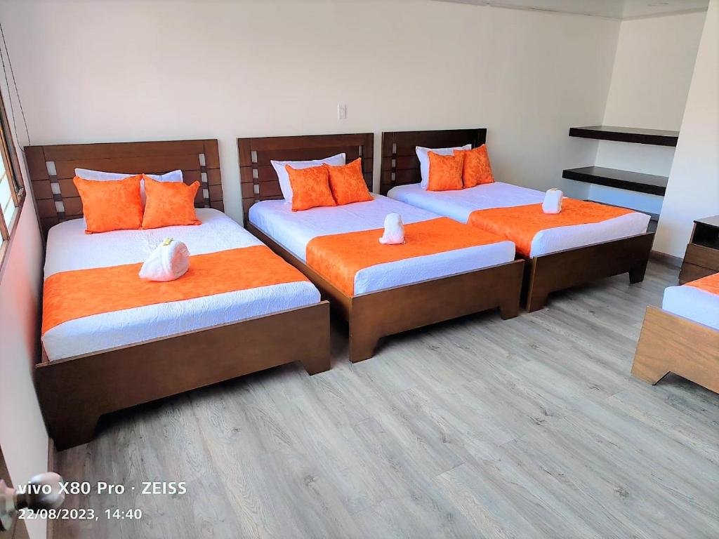 Postel nebo postele na pokoji v ubytování Hotel Kristal Ferial