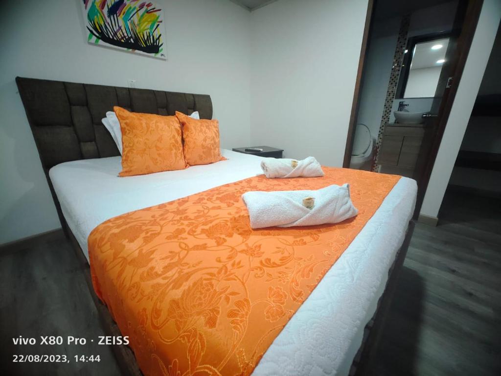 Postel nebo postele na pokoji v ubytování Hotel Kristal Ferial