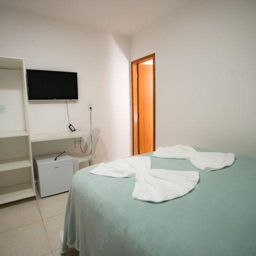 Postel nebo postele na pokoji v ubytování Pousada Villa Costeira