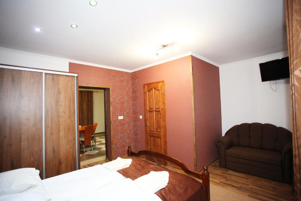 Postel nebo postele na pokoji v ubytování Mirage Hotel