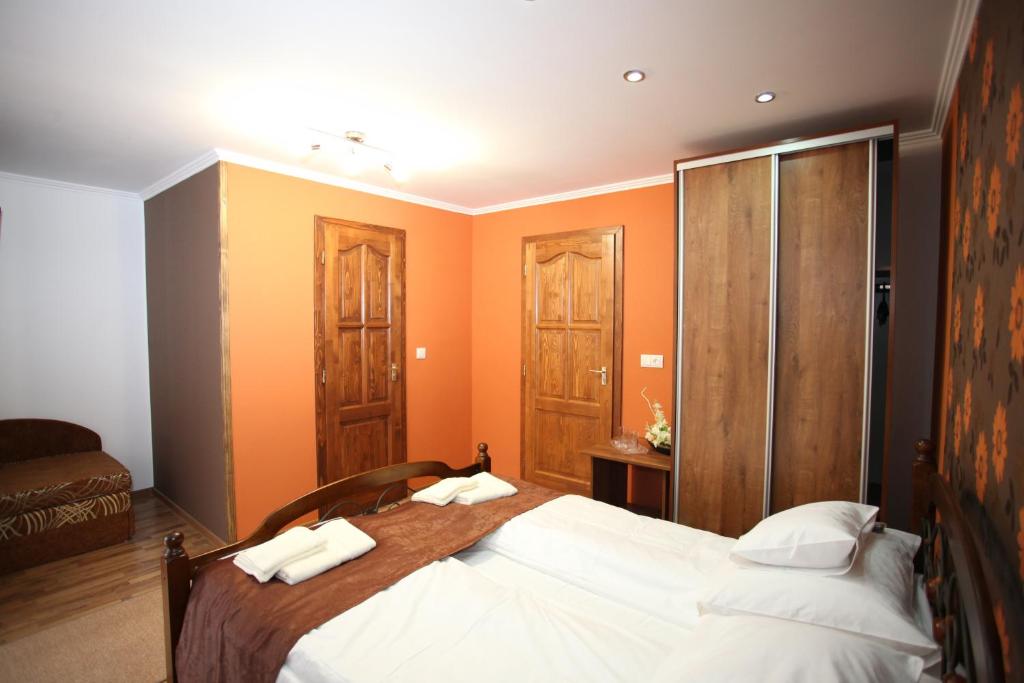 Postel nebo postele na pokoji v ubytování Mirage Hotel