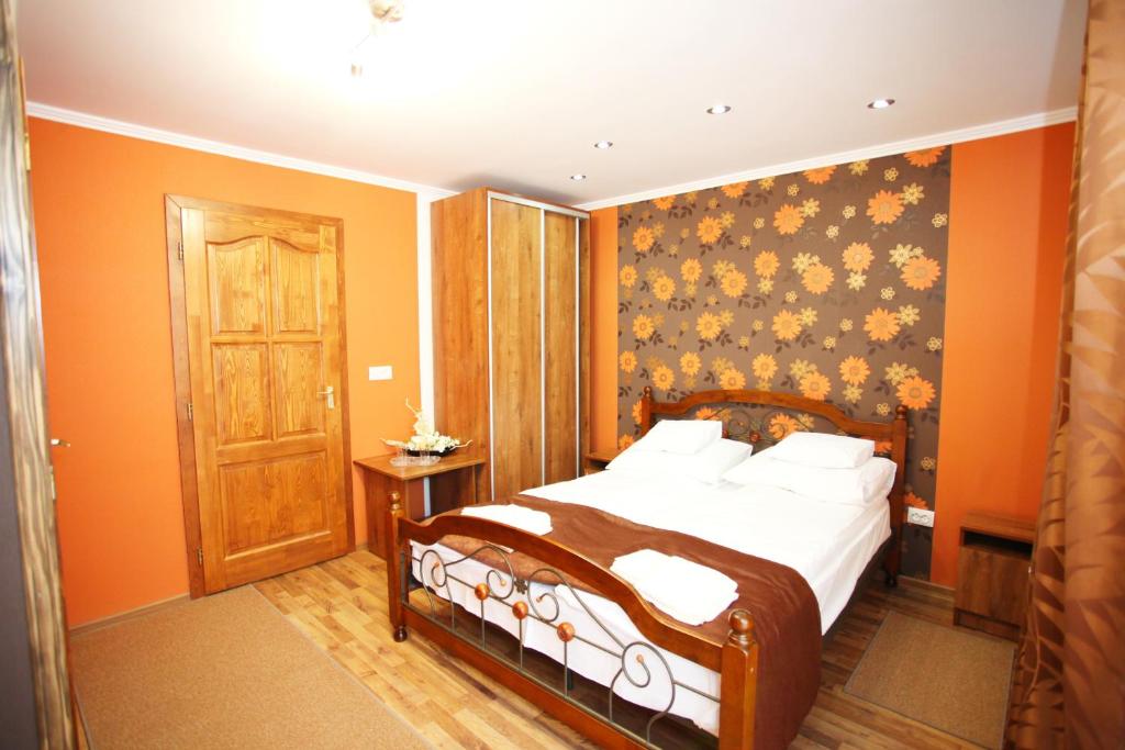 Postel nebo postele na pokoji v ubytování Mirage Hotel