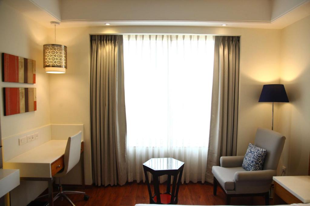 Istumisnurk majutusasutuses The Place Gurugram, a member of Radisson Individuals