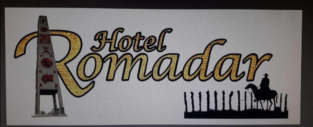ein Schild mit den Worten Hotelzüchter drauf in der Unterkunft Hotel Romadar in Puerto López