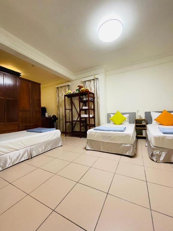 Postel nebo postele na pokoji v ubytování Jeanette Home