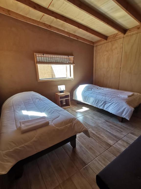 Postel nebo postele na pokoji v ubytování Samay Lodge