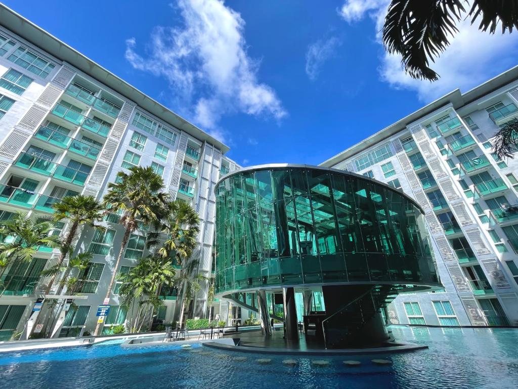 a building with a glass dome in front of it at City Center Residence & Hot Hot Hot in Pattaya Central