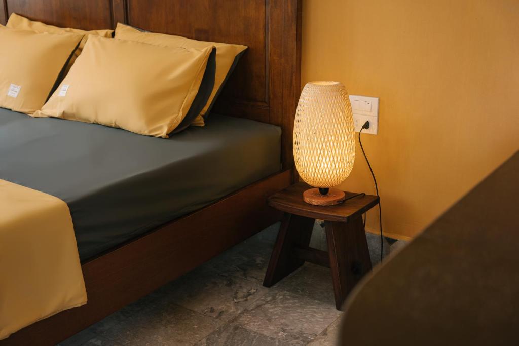 Postel nebo postele na pokoji v ubytování An Nam Art House
