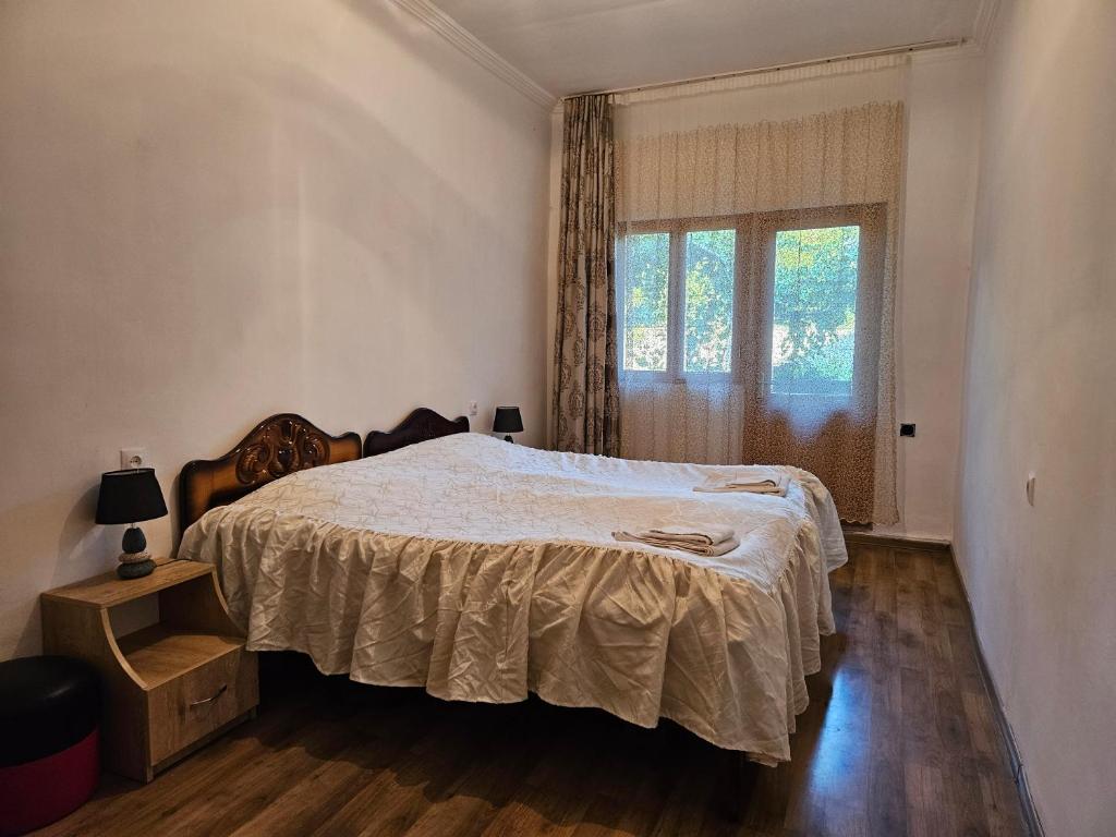 Postel nebo postele na pokoji v ubytování Guest House Aleksandre