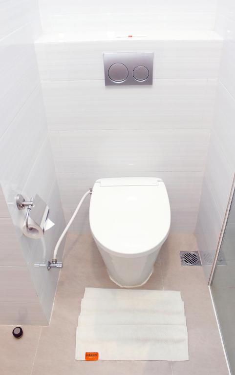 Koupelna v ubytování HARRIS Hotel Samarinda