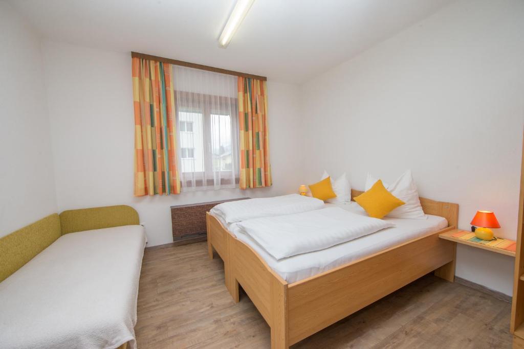 Posteľ alebo postele v izbe v ubytovaní Ferienhaus Gerlinde II