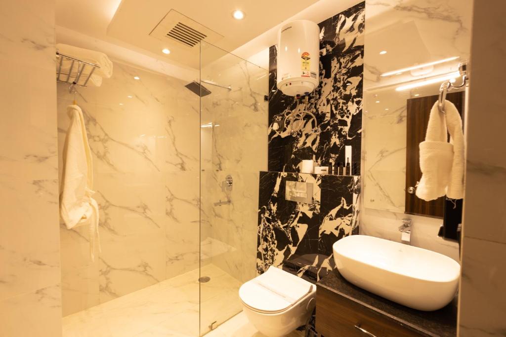 Koupelna v ubytování Hyphen Business Hotel