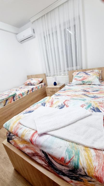 Postel nebo postele na pokoji v ubytování Rooms LikeHome