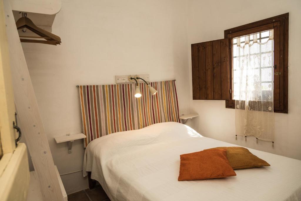 Postel nebo postele na pokoji v ubytování B&b Cinque Stalle