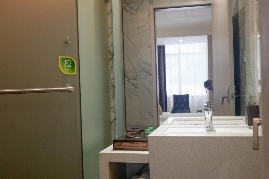 Koupelna v ubytování Paco Hotel Tianhe Coach Terminal Metro Satation Guangzhou-Free Shuttle Bus for Canton Fair