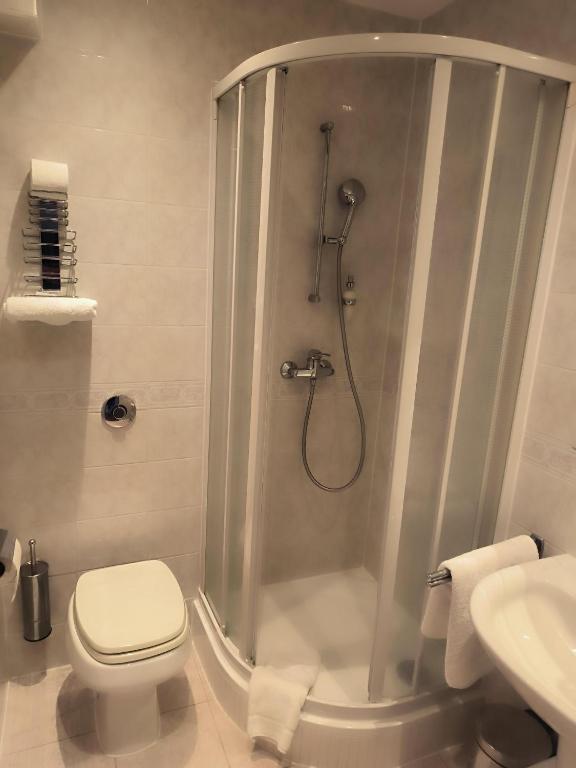 Koupelna v ubytování Hotel Trinity