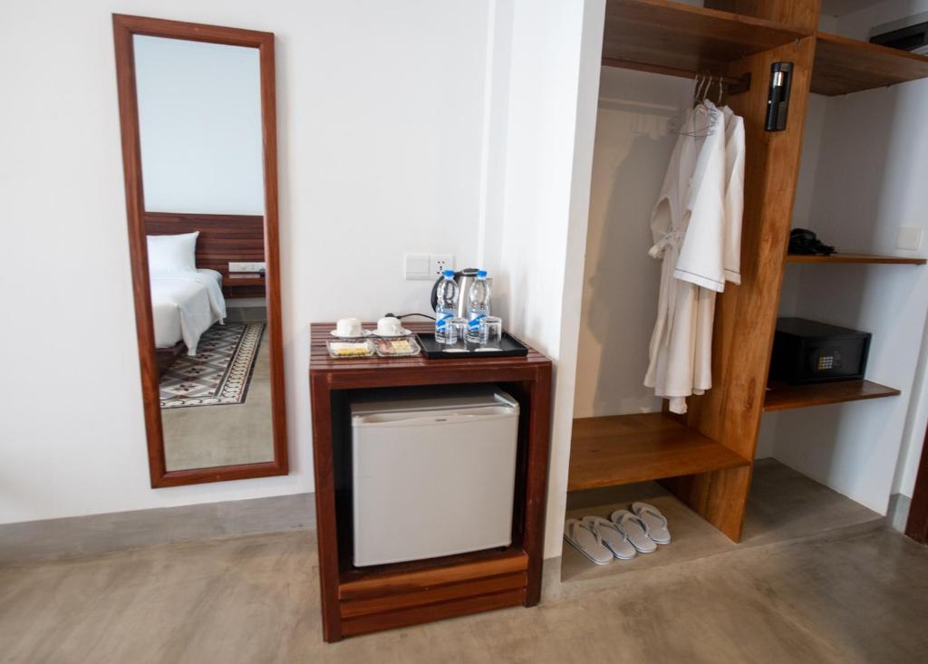 Postel nebo postele na pokoji v ubytování DACO Hotel