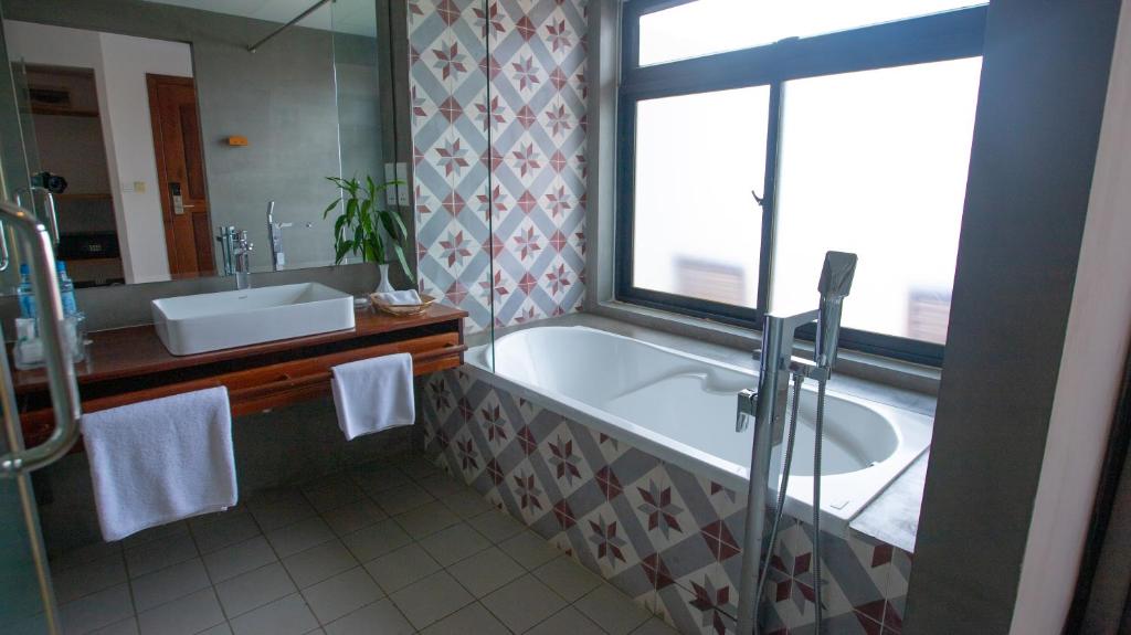 Koupelna v ubytování DACO Hotel