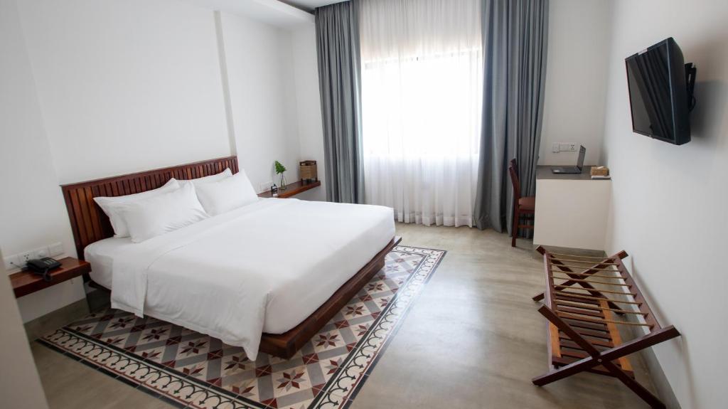 TV a/nebo společenská místnost v ubytování DACO Hotel