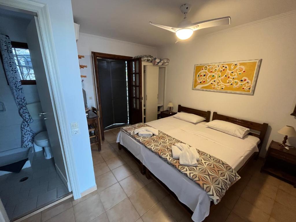 Postel nebo postele na pokoji v ubytování Villa Perris Studios