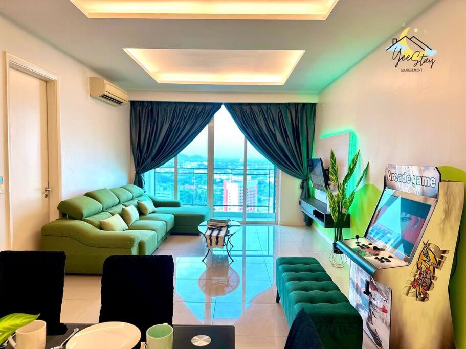 Ruang duduk di The Shore Residences 6-10pax/TV videoGame