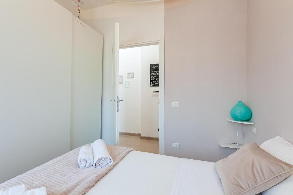 Posteľ alebo postele v izbe v ubytovaní Apartment near to San Peter Vatican JOYA ROMA
