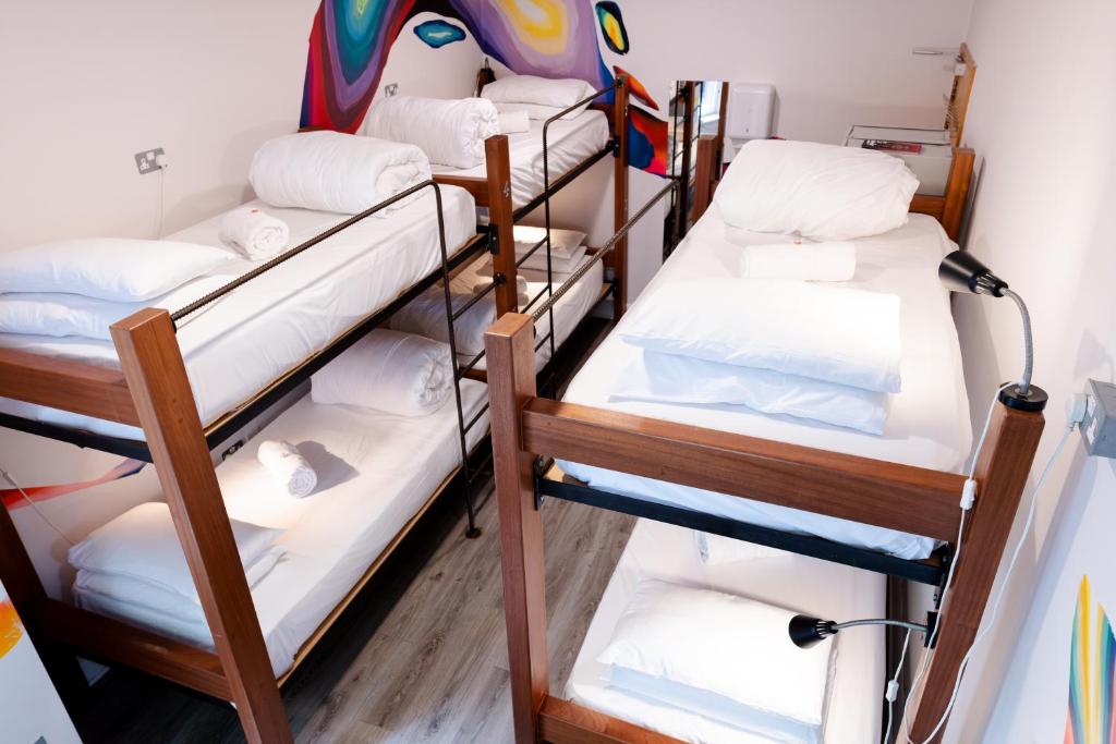 Letto o letti in una camera di The Nest Boutique Hostel