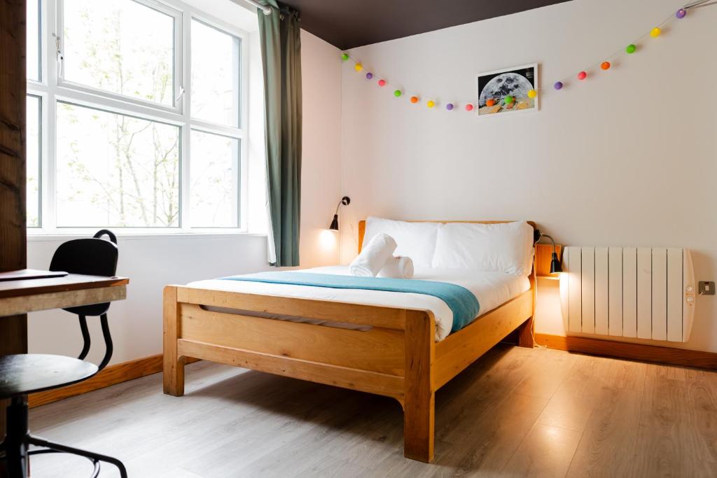 Letto o letti in una camera di The Nest Boutique Hostel
