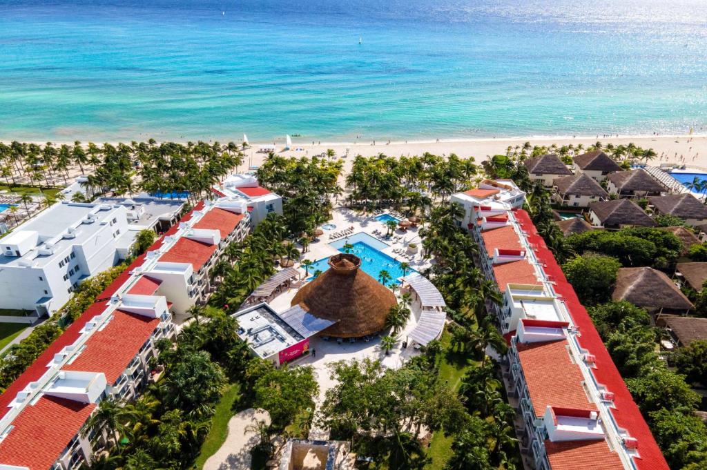 an aerial view of a resort and the beach at Viva Azteca by Wyndham, A Trademark All Inclusive Resort in Playa del Carmen