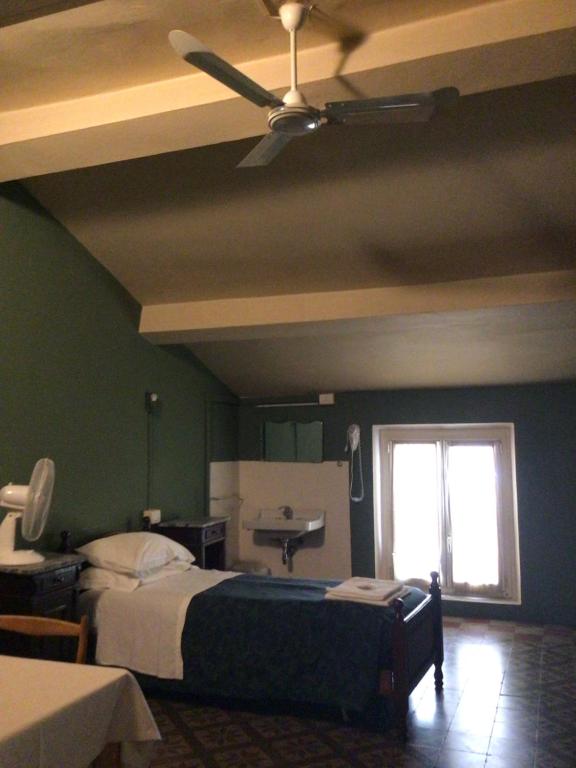 Postel nebo postele na pokoji v ubytování Leon doro