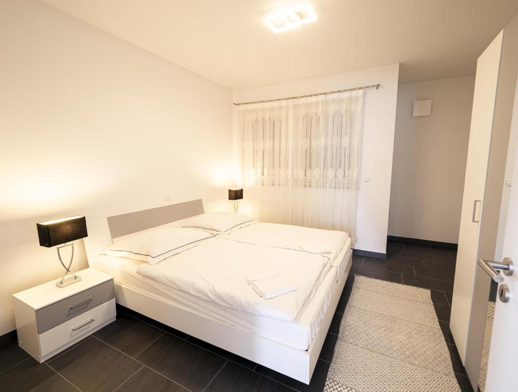 Ένα ή περισσότερα κρεβάτια σε δωμάτιο στο Ferienwohnung Seymen