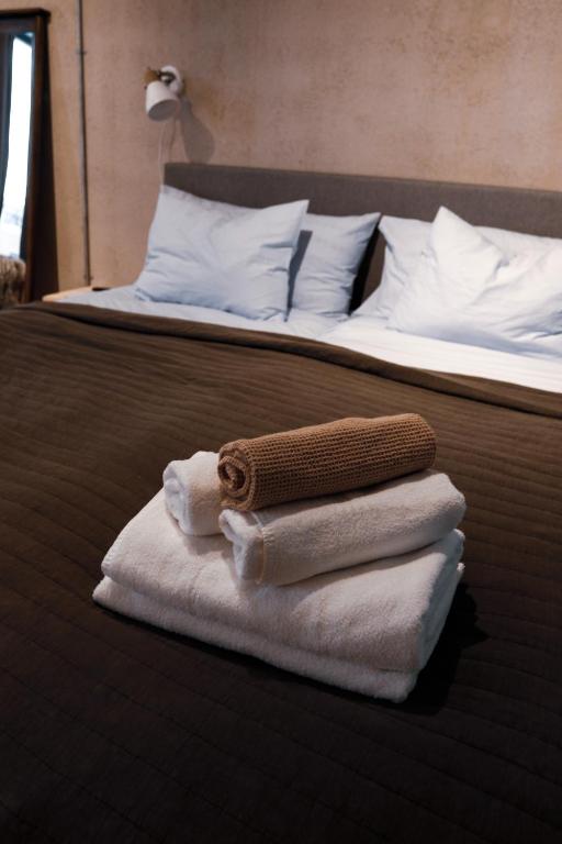 Postel nebo postele na pokoji v ubytování Sångbergs Hotell