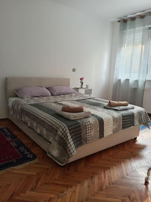 Postel nebo postele na pokoji v ubytování Carpe Diem Vrbas