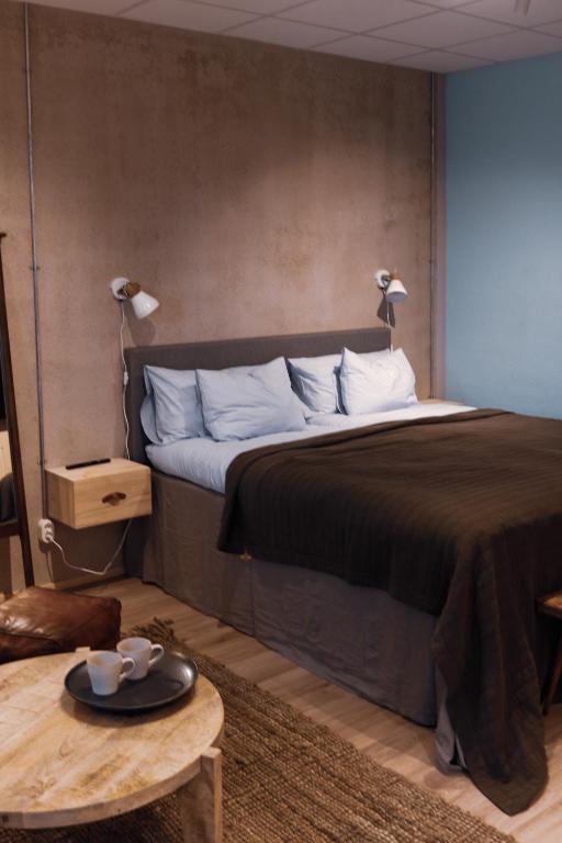Postel nebo postele na pokoji v ubytování Sångbergs Hotell