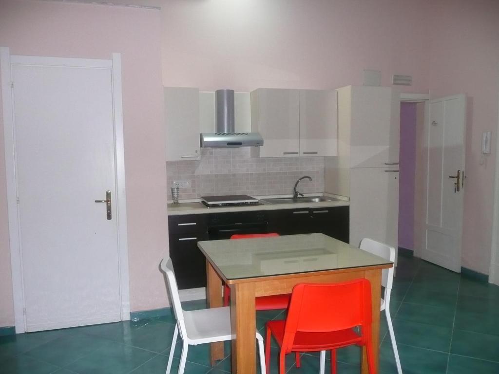 Kuchyň nebo kuchyňský kout v ubytování I Papiri B&B Aparthotel
