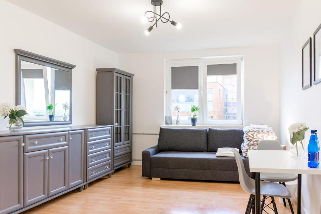 Χώρος καθιστικού στο Apartament Puławska 105